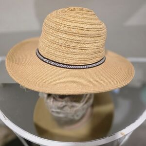 Elegant Tan Wide-Brim Hat with Black Accent
